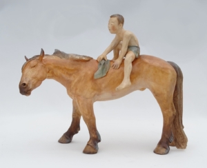 Cheval orange avec son cavalier